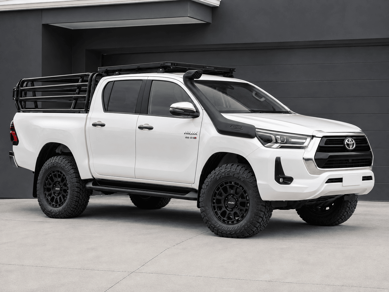 White Toyota Hilux in a Nordak visual concept with Natko Utility-style cattle rails and other selected accessories