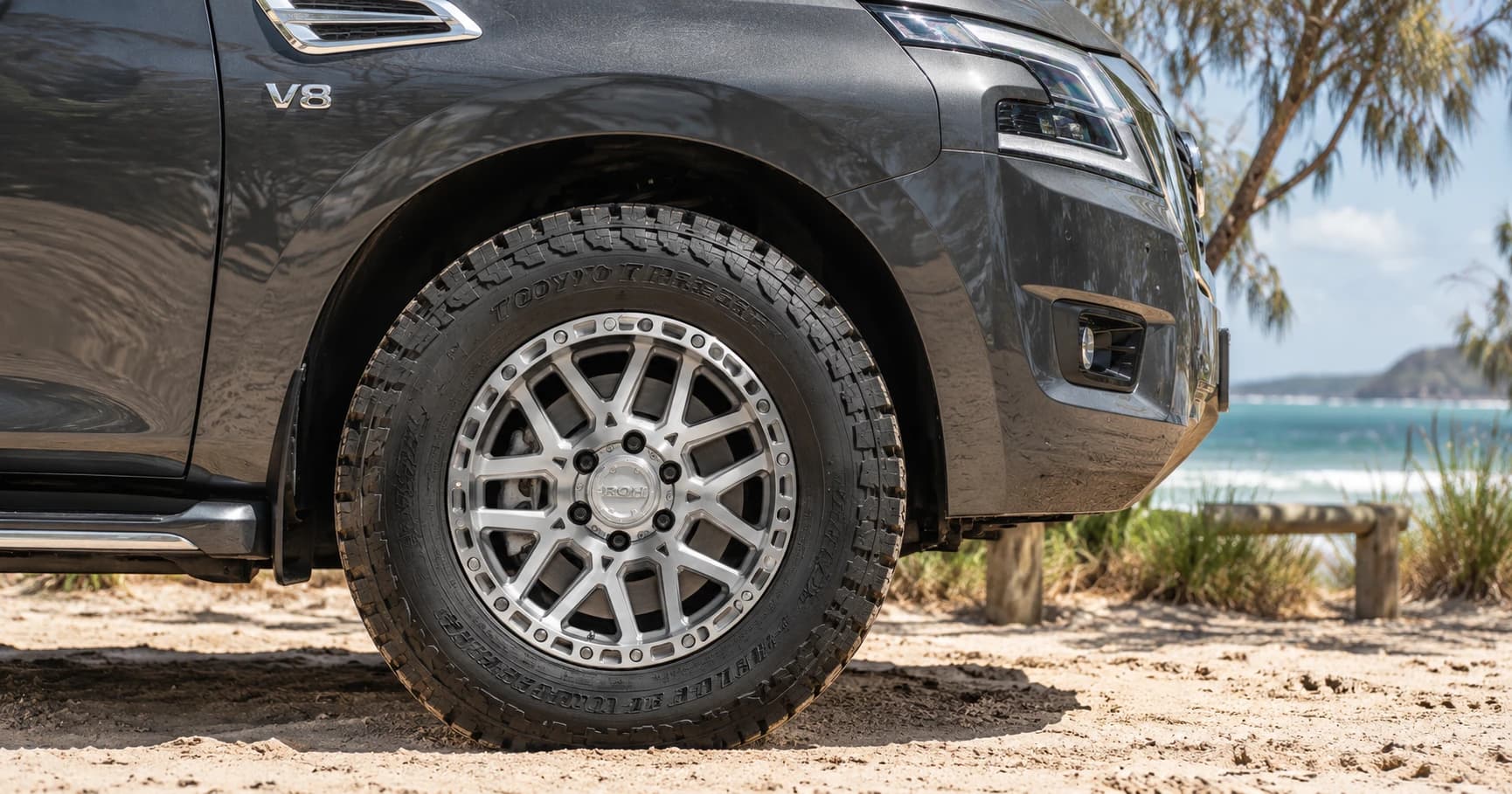 Front-wheel detail of a 2024 Nissan Patrol Ti 4x4 with ROH Crawler wheels in Machined