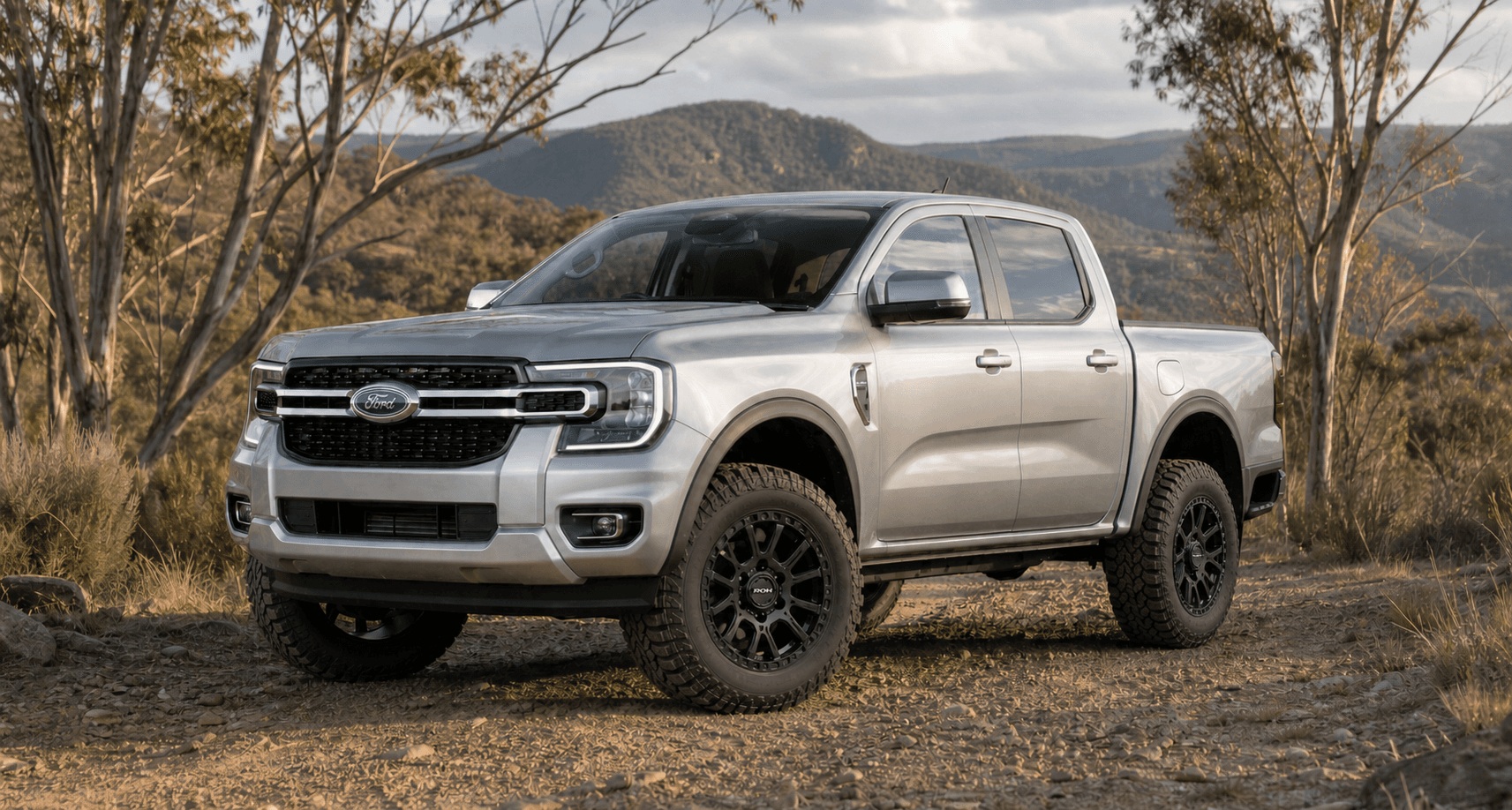 Silver Next-Gen Ford Ranger fitted with matte-black ROH Crawler wheels