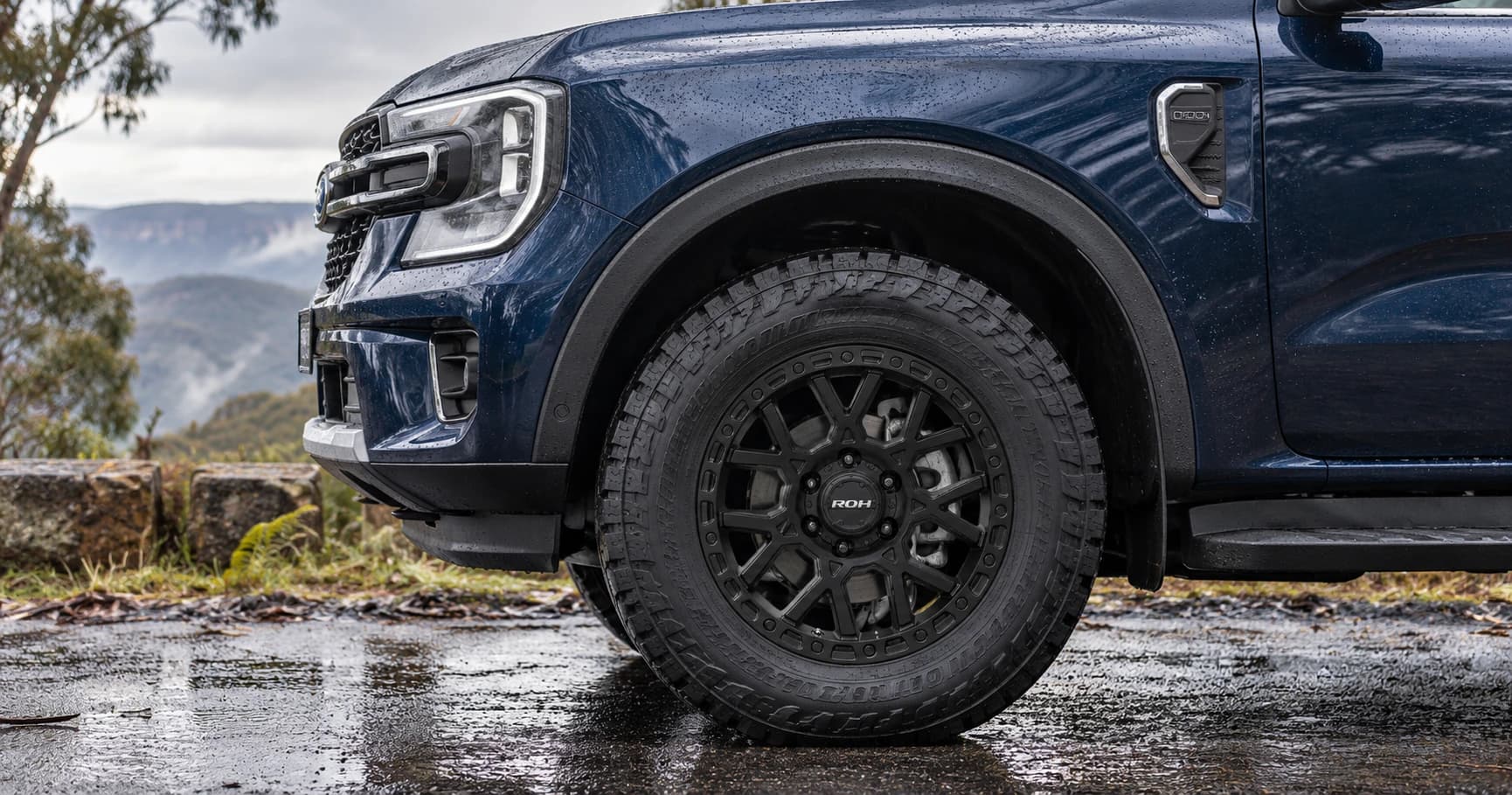 Front-wheel detail of a 2024 Ford Everest Trend 4WD with ROH Crawler wheels in Matte Black
