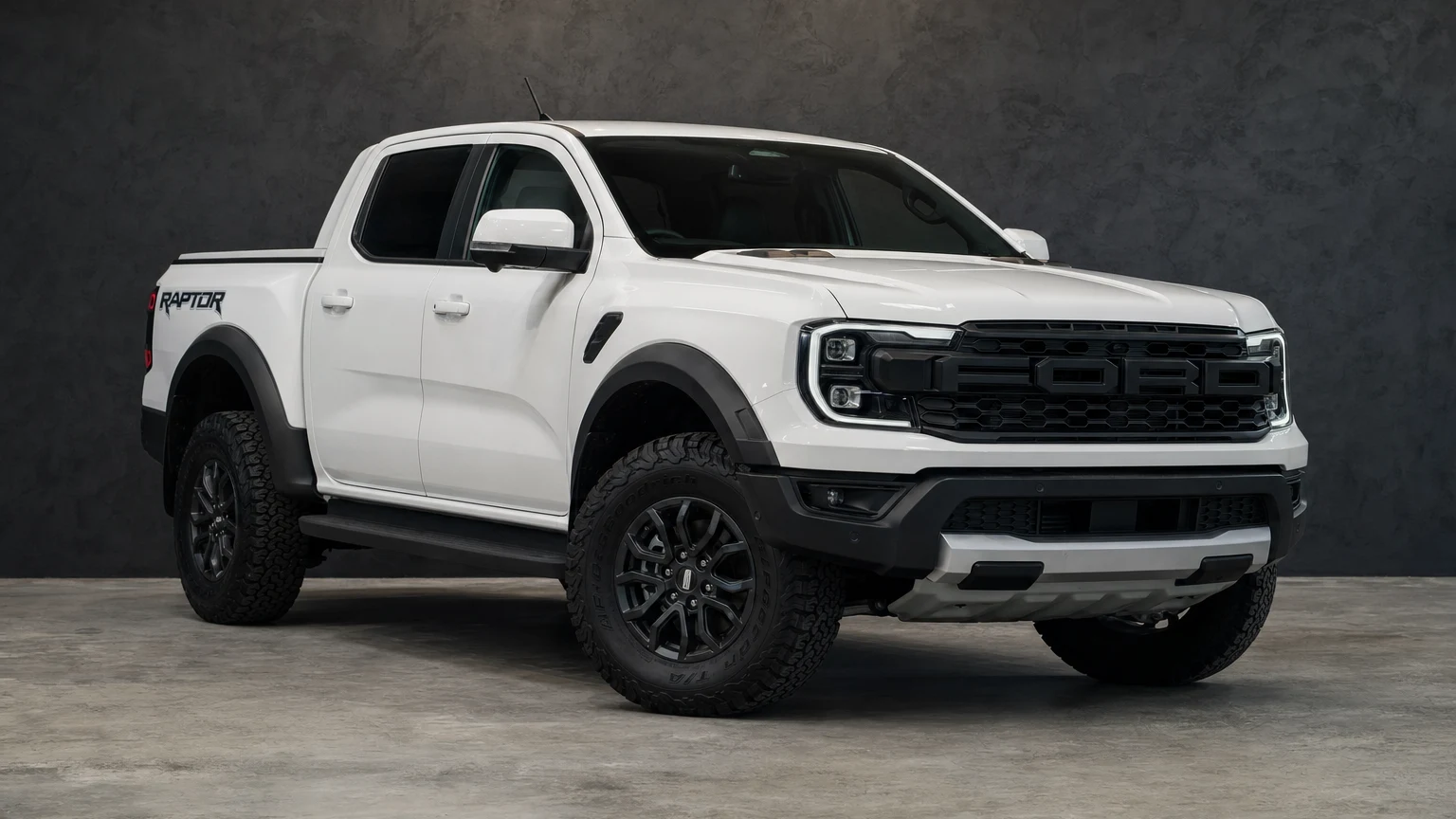Stock white Ford Ranger Raptor in a charcoal photography studio